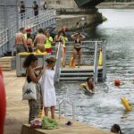 parisians-dive-into-the-seine-after-a-century-long-ban