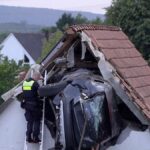 urgent-car-crashes-into-barn-roof-in-germany-injuries-reported