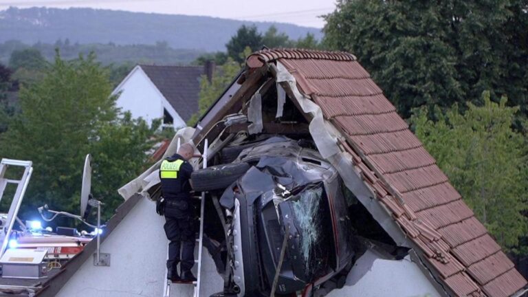 urgent-car-crashes-into-barn-roof-in-germany-injuries-reported