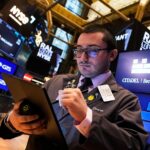 wall-street-divided-as-tech-stocks-plunge-amid-broader-market-gains