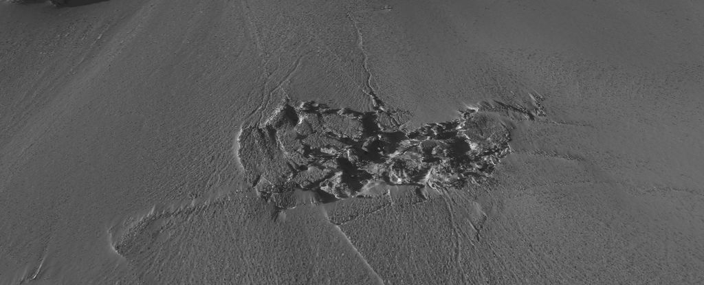 water-surge-uncovers-hidden-forces-beneath-greenland-s-ice-sheet