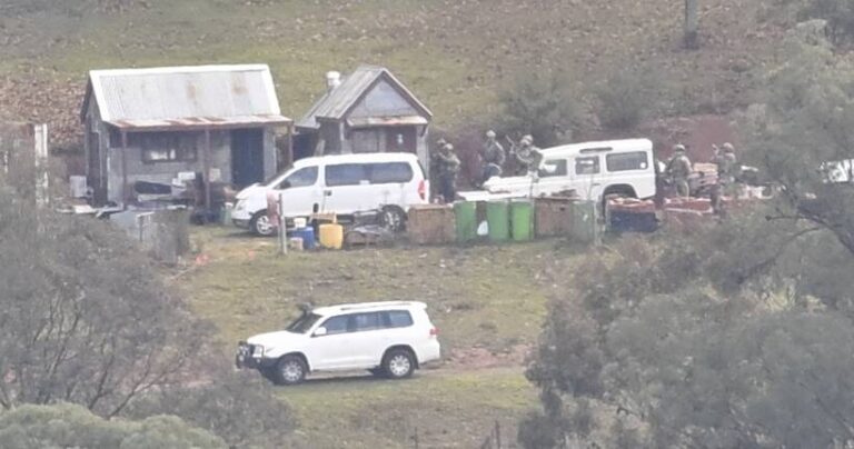 man-charged-with-gun-drug-offences-amid-ongoing-manhunt