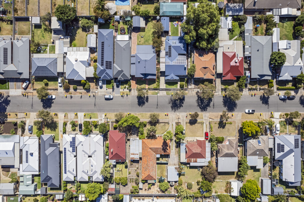 Aerial view directly above established houses in older Adelaide southern suburb