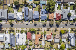 Aerial view directly above established houses in older Adelaide southern suburb