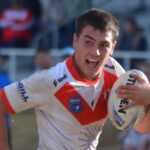 rhinos-charge-to-grand-final-as-vardanega-secures-hat-trick