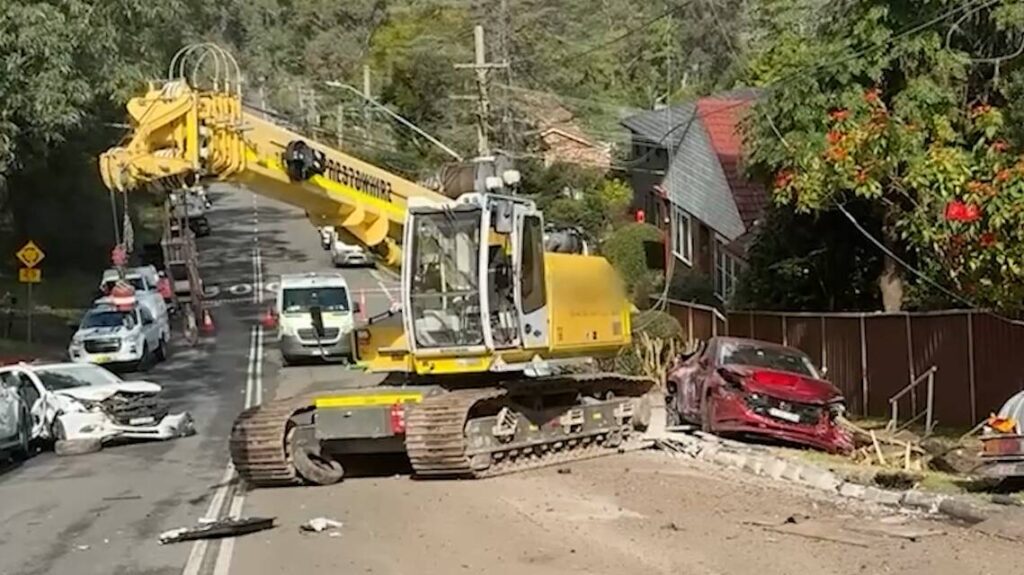 runaway-truck-and-excavator-crash-into-11-cars-no-injuries-reported