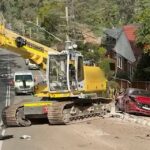 runaway-truck-and-excavator-crash-into-11-cars-no-injuries-reported