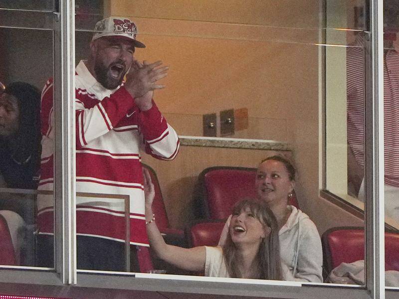 taylor-swift-and-travis-kelce-celebrate-engagement-at-game