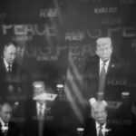 A broadcast of President Donald Trump and President Vladimir Putin of Russia meet at Joint Base Elmendorf-Richardson in Anchorage, Alaska, on Friday, Aug. 15, 2025. (Ioulex/The New York Times)