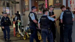 two-men-charged-after-violent-clash-with-police-in-sydney
