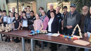 kids-shed-donates-handmade-trains-for-salvation-army-appeal