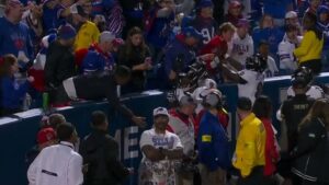 lamar-jackson-pushes-fan-after-helmet-hit-in-ravens-loss
