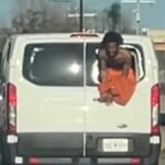 oklahoma-inmate-dangles-from-moving-van-in-desperate-escape-attempt