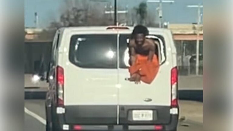 oklahoma-inmate-dangles-from-moving-van-in-desperate-escape-attempt