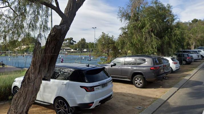 Multiple vehicles use the verge on Bay View.