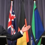 surge-in-income-tax-revenue-narrows-australian-budget-deficit
