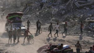 aid-begins-to-flow-into-gaza-as-hostage-body-dispute-continues