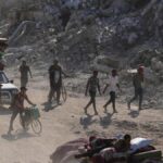 aid-enters-gaza-as-hostage-body-dispute-continues