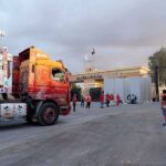 aid-trucks-stream-into-gaza-as-ceasefire-sparks-hope