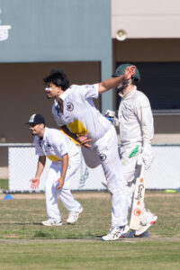 cats-battle-hard-against-spotswood-in-crucial-cricket-clash