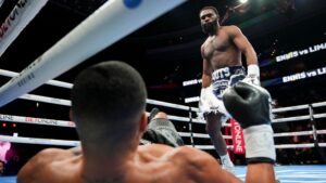 ennis-claims-interim-title-with-first-round-knockout-of-lima