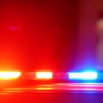 Accident or crime scene concept - flashing police lights