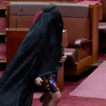 pauline-hanson-suspended-after-burqa-stunt-amid-outrage