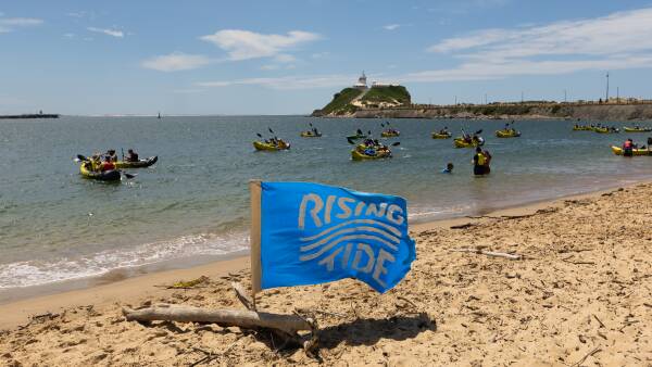 rising-tide-protests-spark-debate-over-extreme-weather-impact