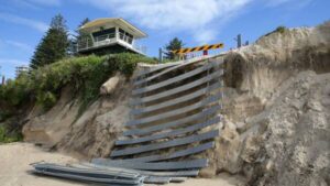 urgent-clash-over-bate-bay-erosion-sparks-community-action