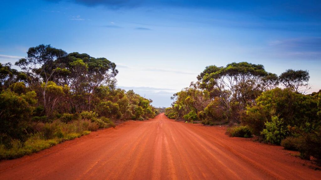 Empty open outback road in Western Australia. Straight single la