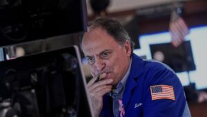 wall-street-dips-amid-ai-valuation-concerns-shutdown-developments