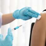 Doctor vaccinated against new strains of the virus for the patie