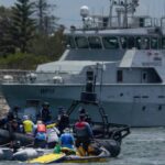 activists-rally-at-rising-tide-protest-tensions-escalate-in-newcastle