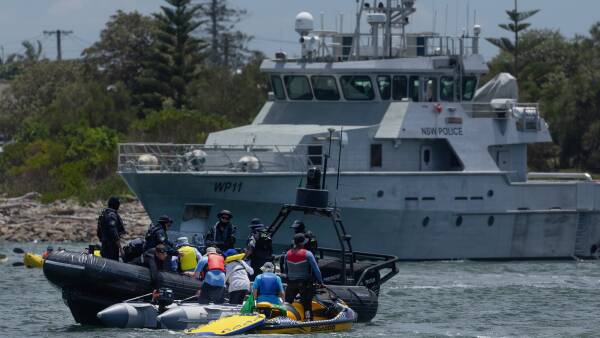 activists-rally-at-rising-tide-protest-tensions-escalate-in-newcastle