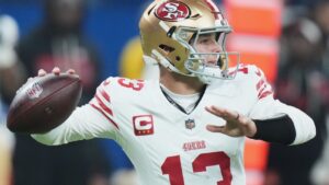 brock-purdy-shines-with-five-touchdowns-49ers-defeat-colts