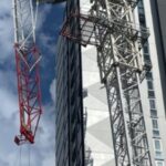 urgent-gold-coast-holiday-chaos-as-crane-remains-dangling