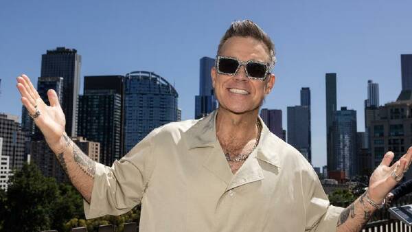 robbie-williams-surprises-fans-with-early-release-of-britpop