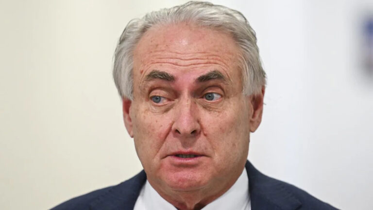 minister-defends-48-178-family-travel-amid-controversy