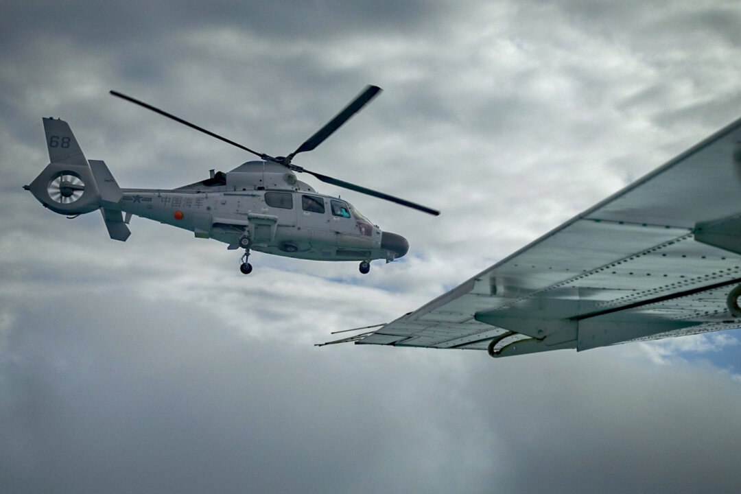 Philippines Conducts Maritime Domain Awareness Mission Above Scarborough Shoal